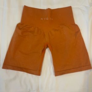 Burnt Orange NVGTN Pro Shorts